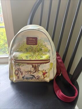 Loungefly Winnie the Pooh Storybook Mini Backpack in Cream & Red